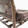 Inca chair by Norell Furniture. Design Arne Norell. Upholstery leather 93287 dark brown, support leather 9368 dark brown, stained wood dark brown 1323.
